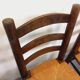 Set of 4 vintage brutalist chairs by Georges Robert in wood and straw.