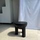 Black mango wood tripod side table with a semi-spherical top, height: 45 cm, diameter: 44 cm.
