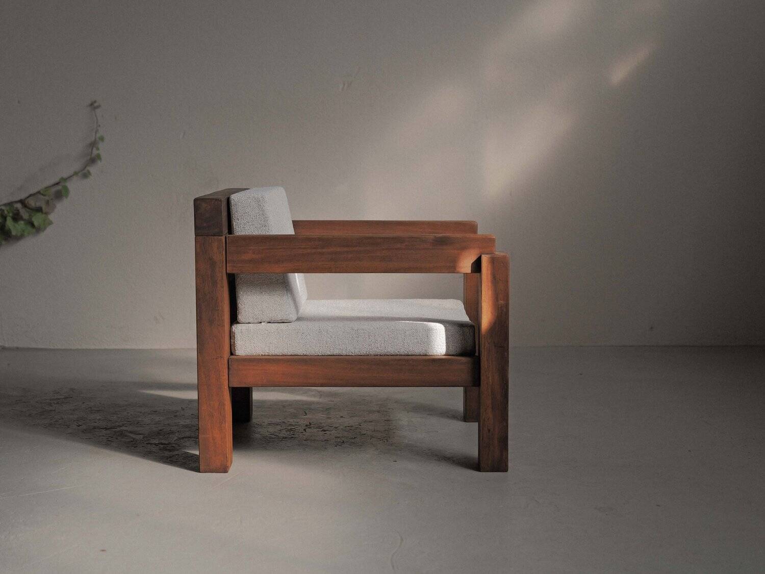 Handcrafted armchair in solid wood and fabric, 1980s-90s.