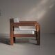Handcrafted armchair in solid wood and fabric, 1980s-90s.