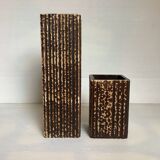 Pair of worked ceramic vases