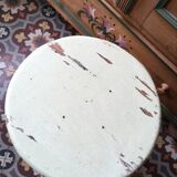 A rough wooden stool patinated by time