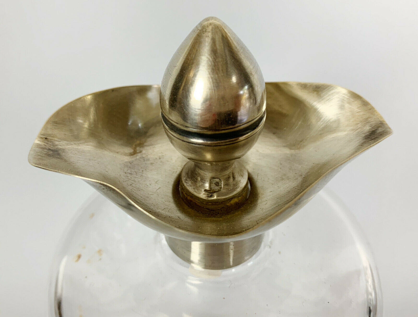 Blown glass carafe with silver frame and cap