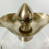 Blown glass carafe with silver frame and cap