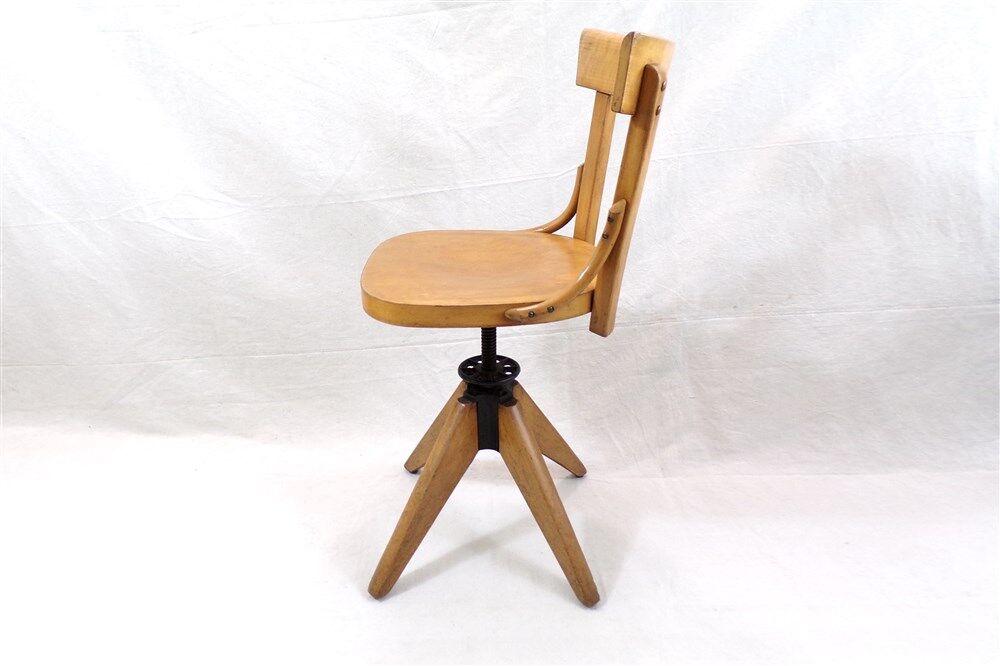 Swivel chair stamped baumann