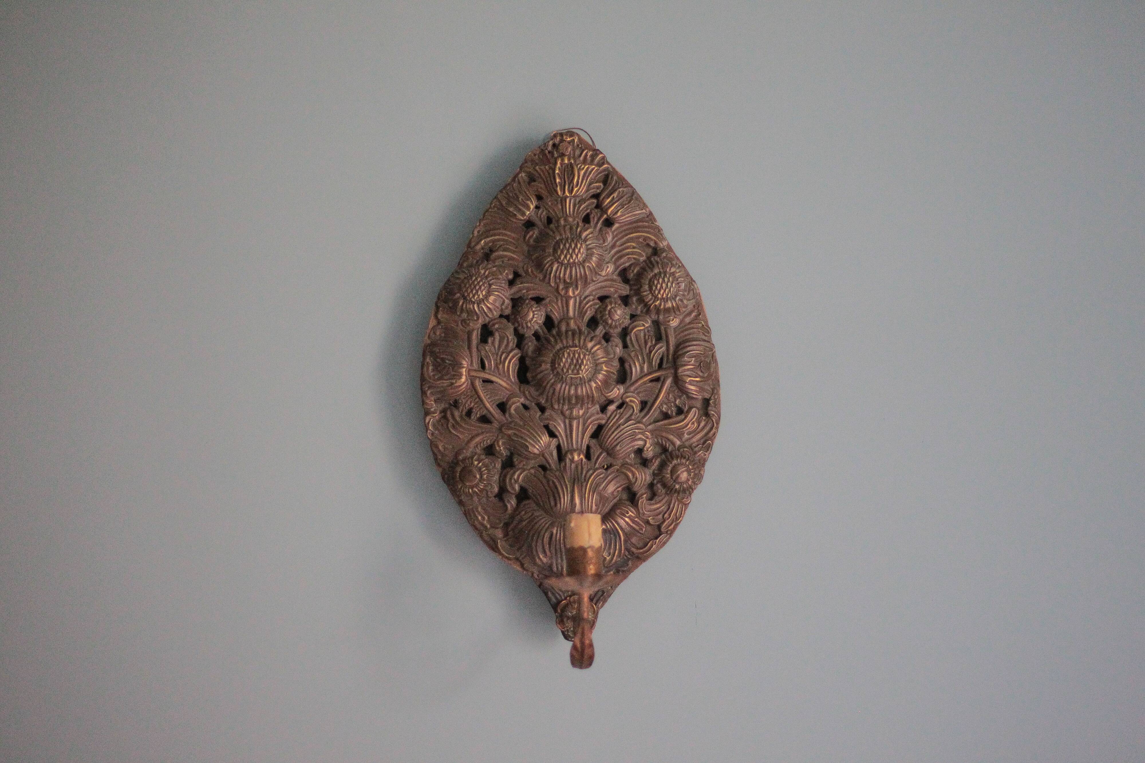 Pair of wall sconces in embossed brass with floral patterns, wall lamp, sconce.