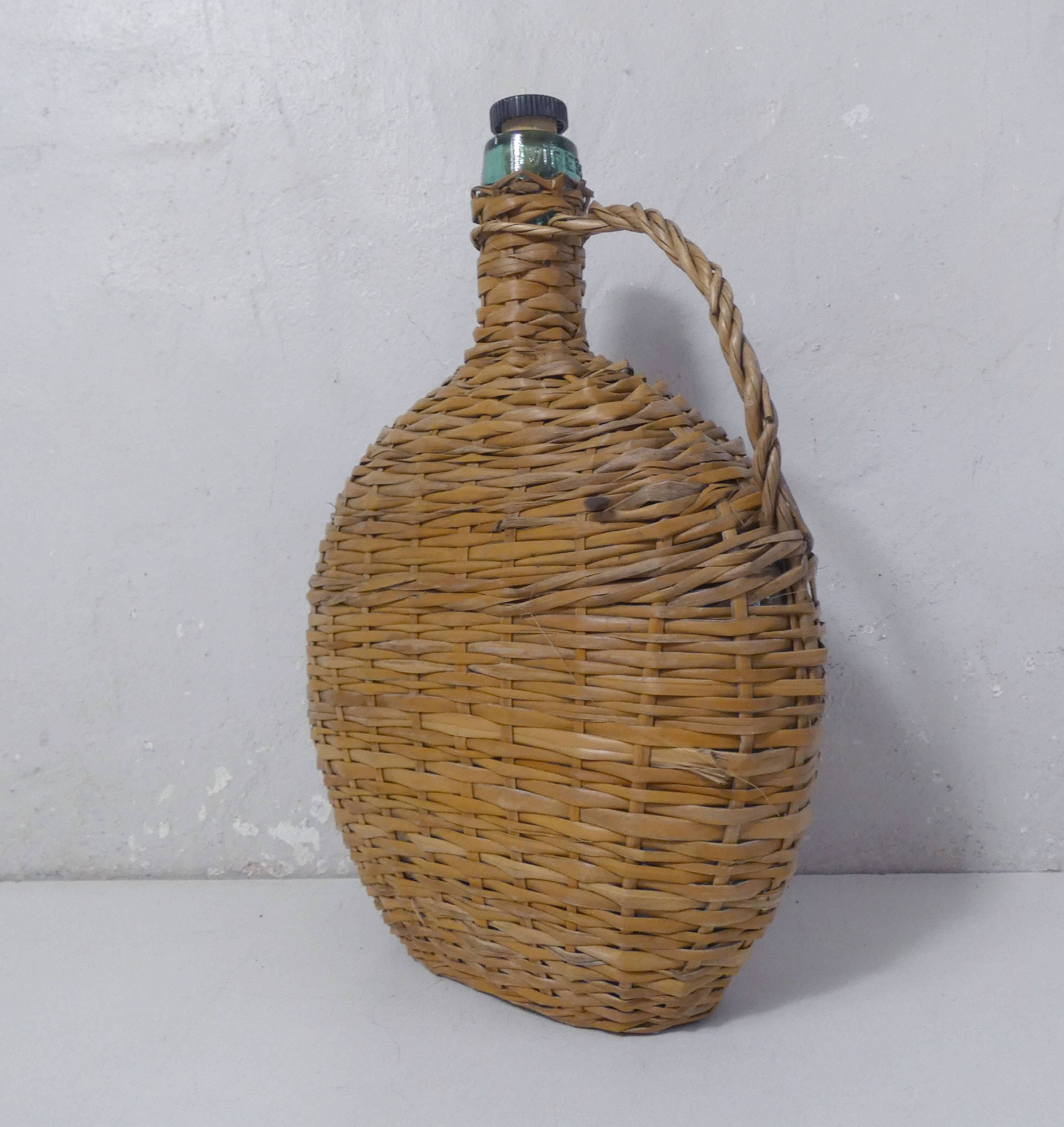 old bottle dressed in rattan vintage pilgrim gourd