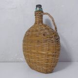 old bottle dressed in rattan vintage pilgrim gourd
