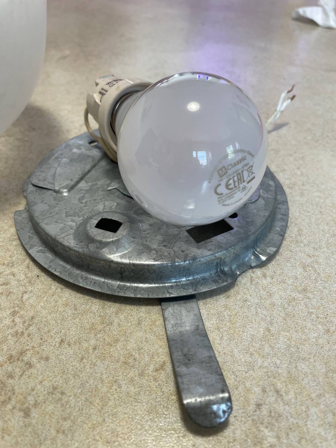 Half-globe ceiling light with speckled glass