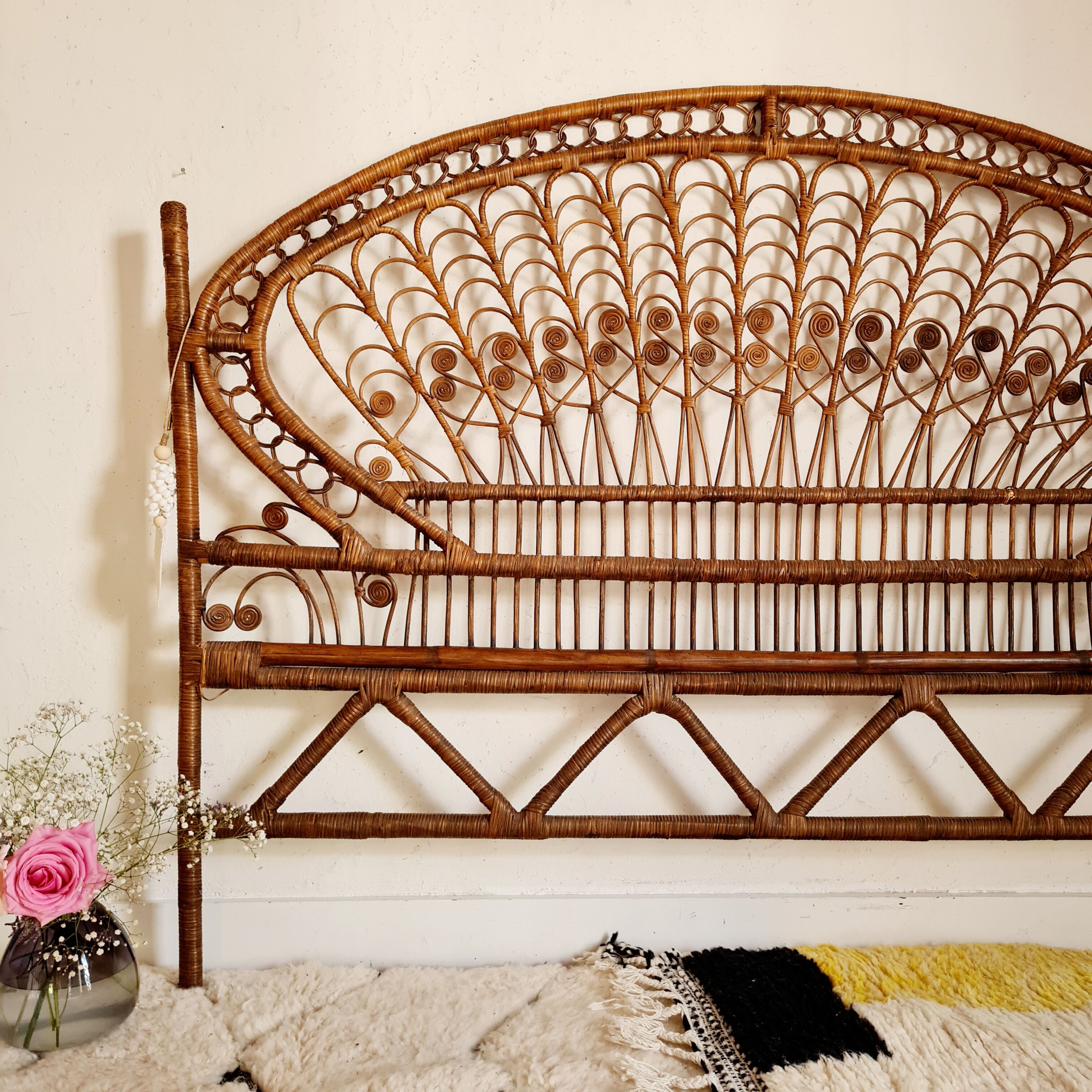 Peacock headboard in vintage rattan