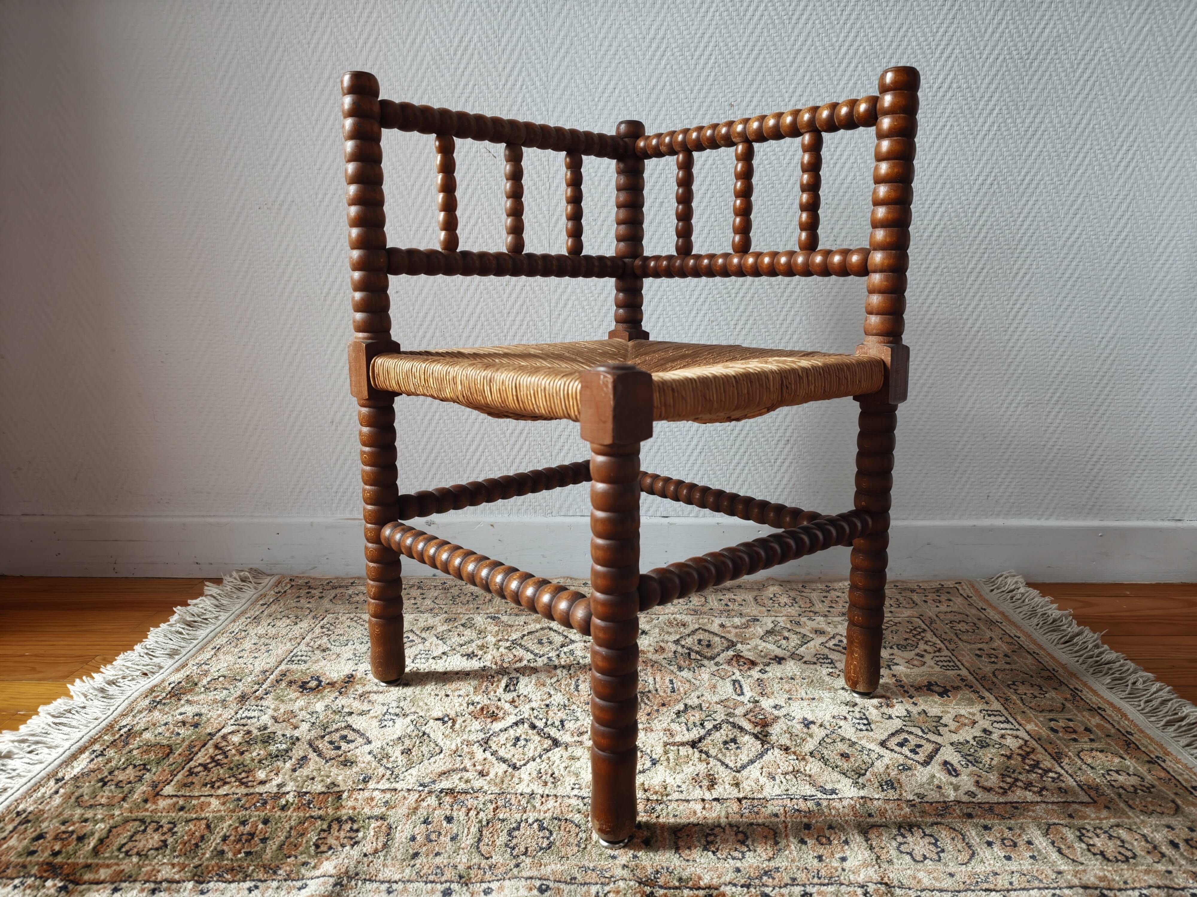 Chaise vintage coin du feu en bois tourné bobine