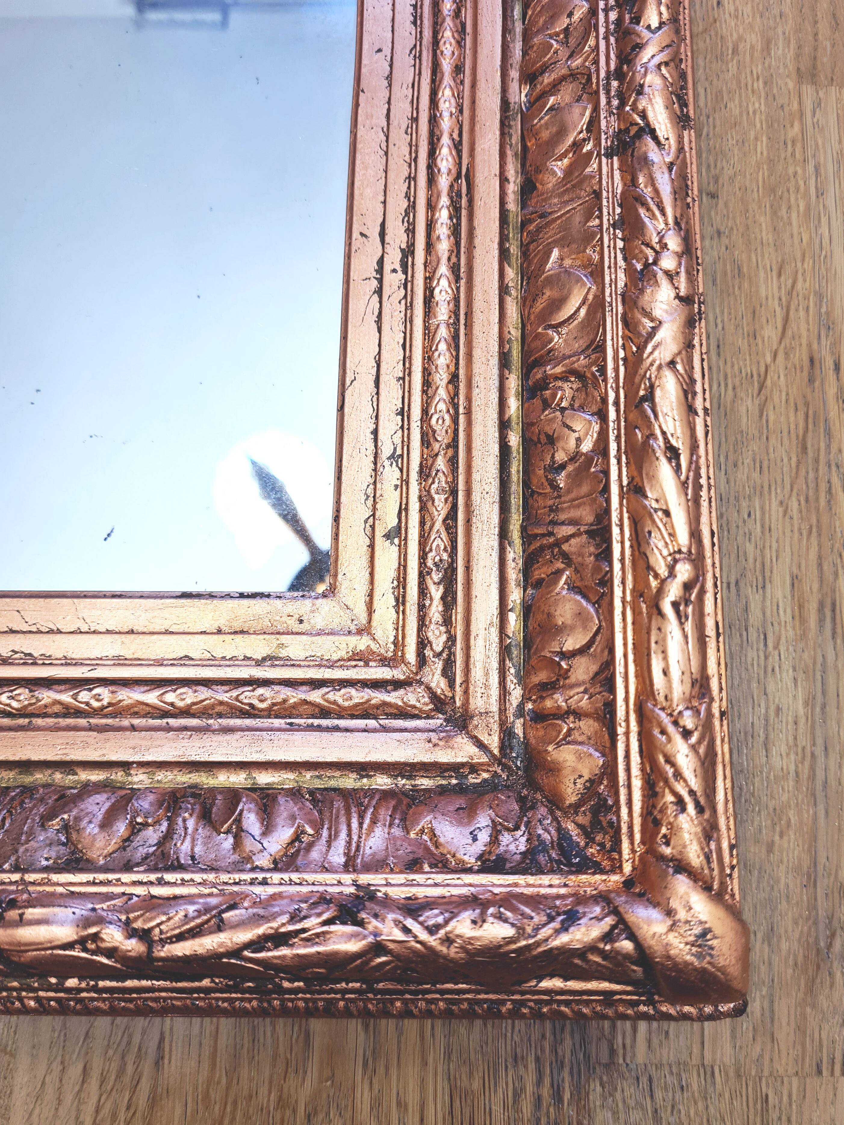 Napoleon III mirror, Wood and stucco, Gilded with copper leaf.