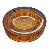 Amber pressed glass ashtray, 1970s design.
