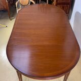 Louis XVl style round table in cherry with extensions