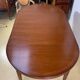 Louis XVl style round table in cherry with extensions