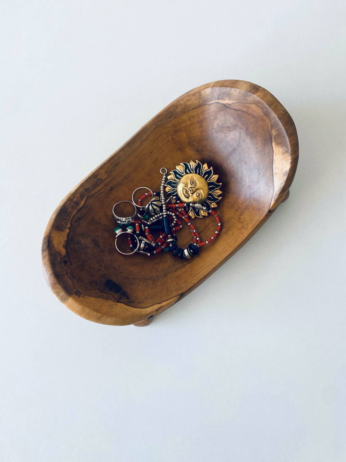 Olive wood pocket emptier