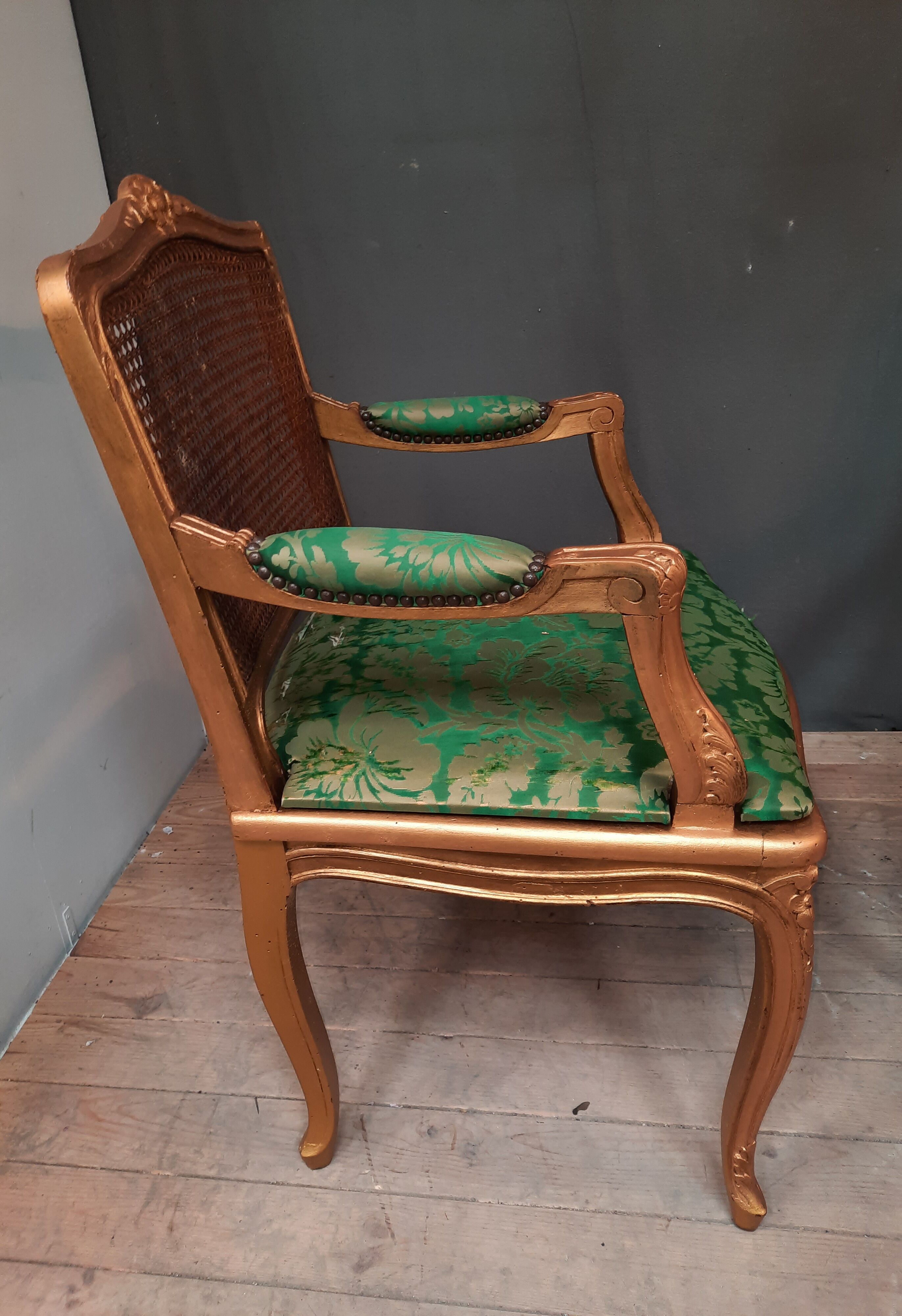 Louis XV-style golden armchair pair