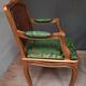 Louis XV-style golden armchair pair