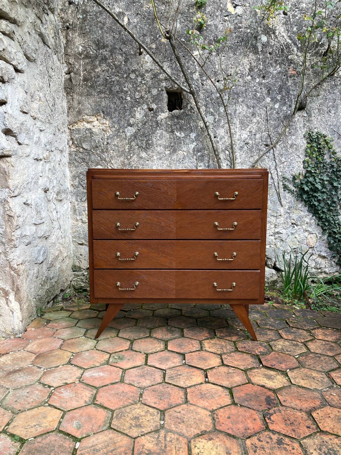 Vintage chest of drawers with tapered legs