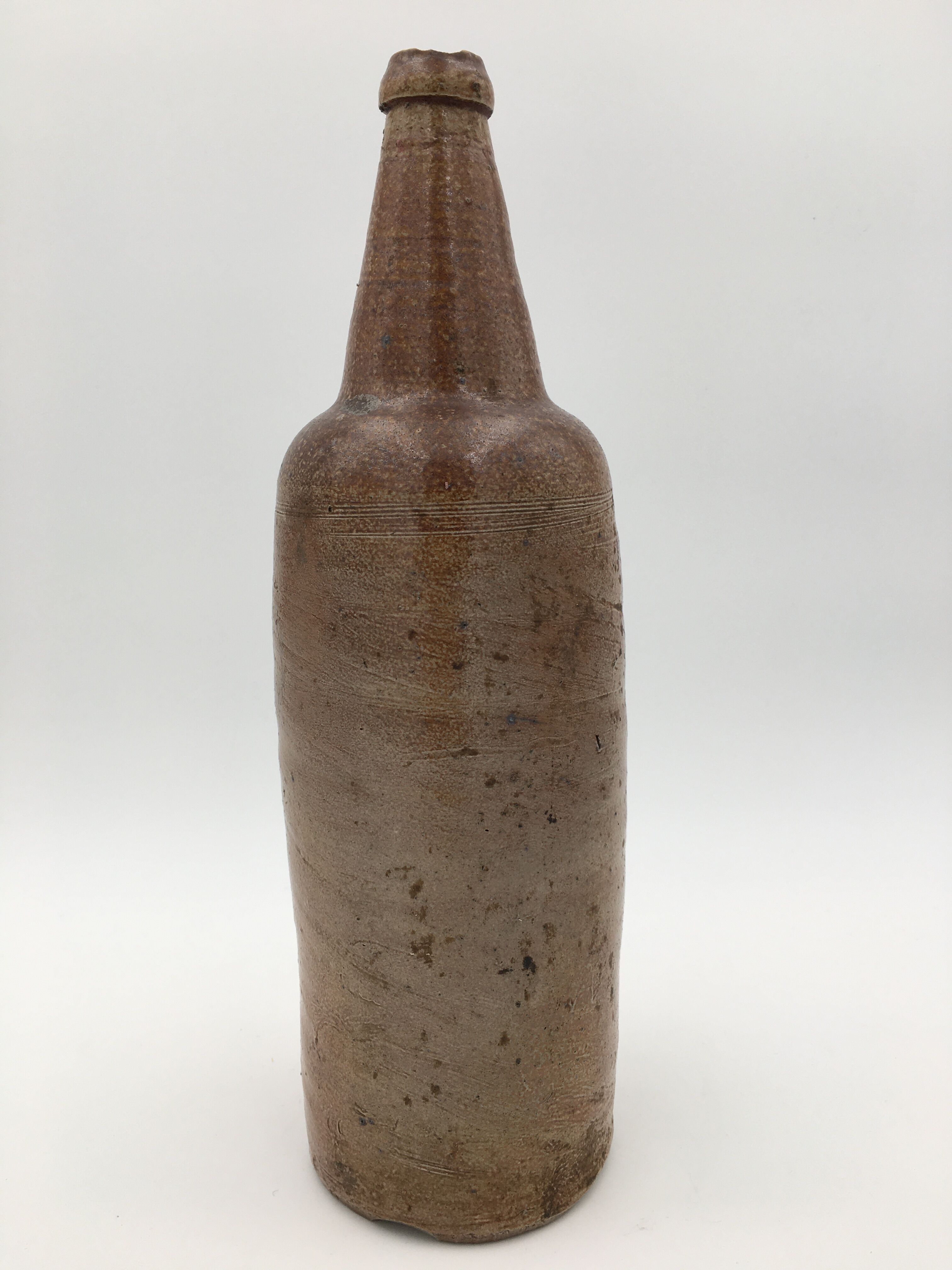Old glazed terracotta bottle, early 20th century