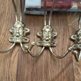 set of 5 antique gold metal hooks