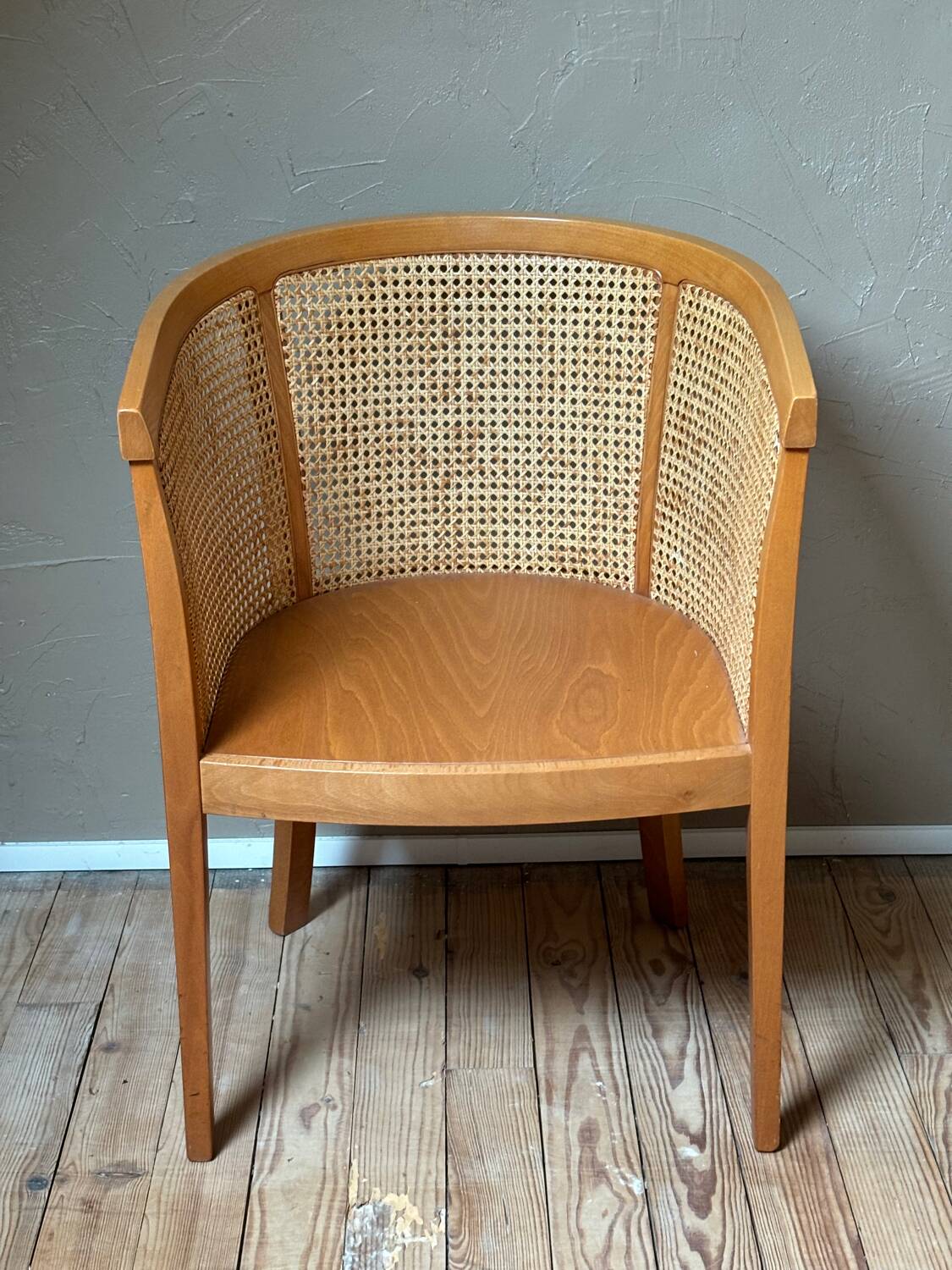 Wooden and cane cabriolet armchair