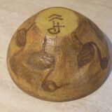 Chamotte clay bowl with bird decoration