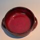 Red ceramic pieces by Gérard Hoffman (1917/1965).