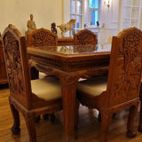 Carved solid teak dining table