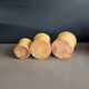 Trio of ancient pots in yellow glazed terracotta.