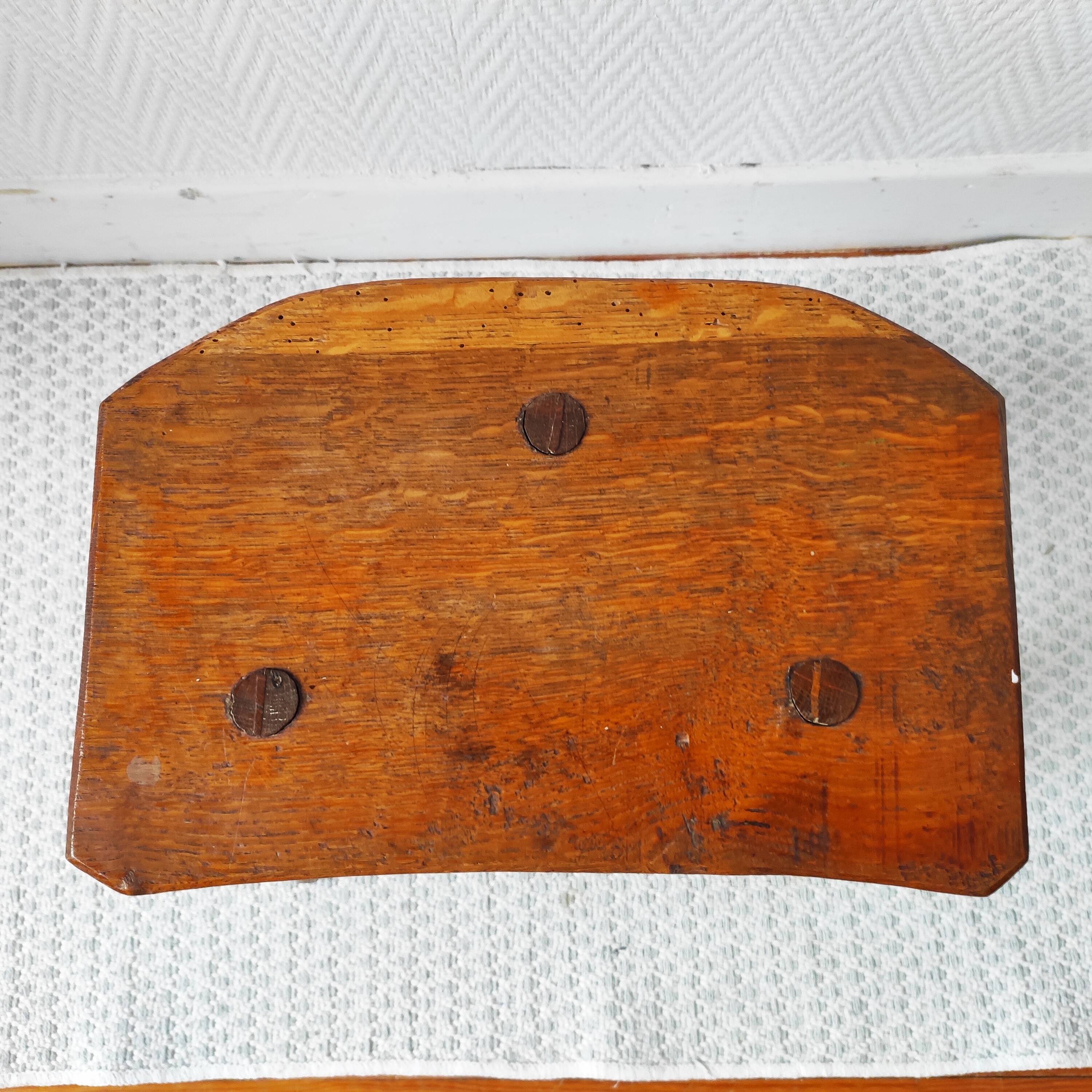 Pair of brutalist tripod stools in solid wood.