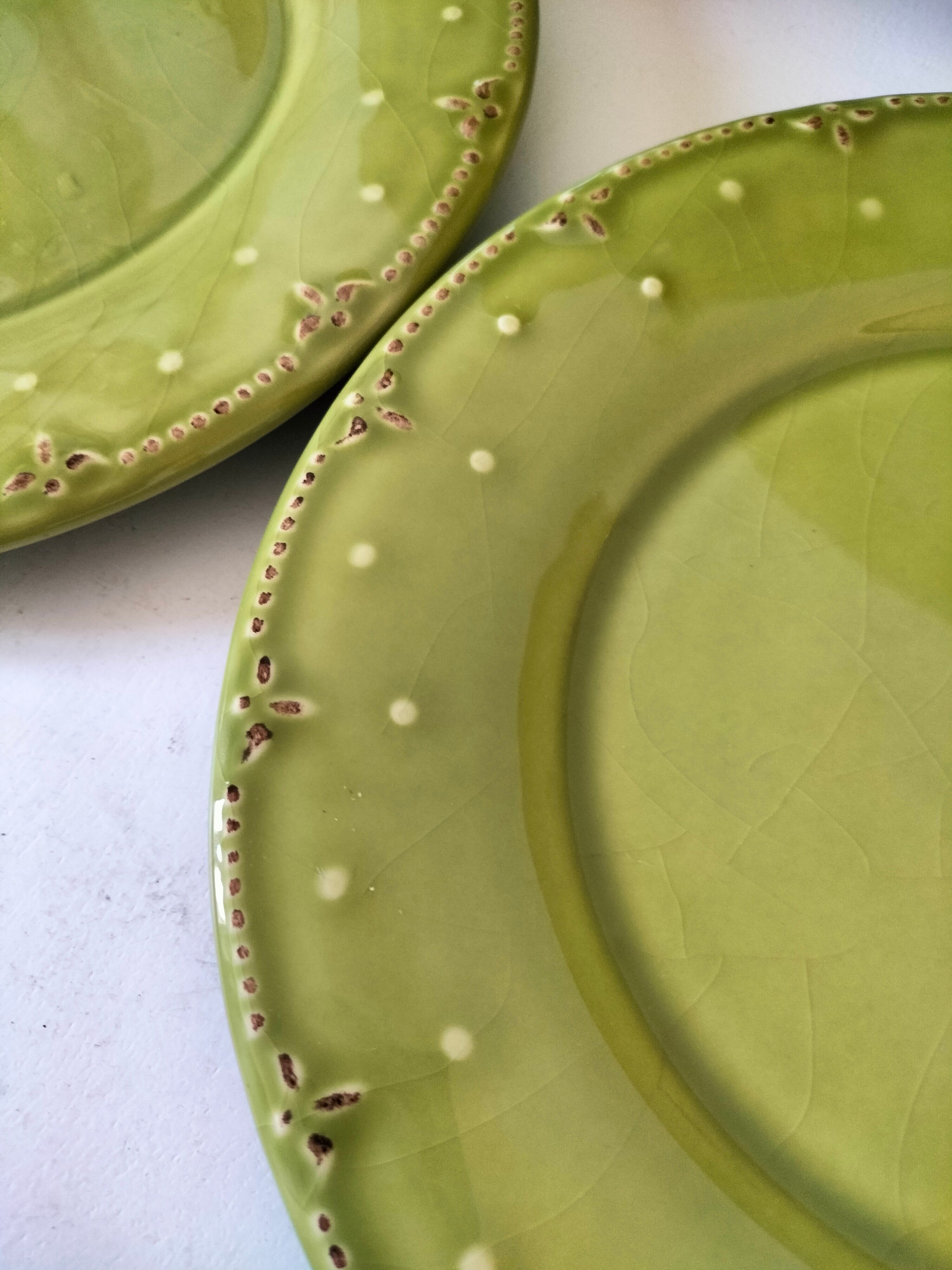 6 olive green plates with dotted relief, workshop ceramic style