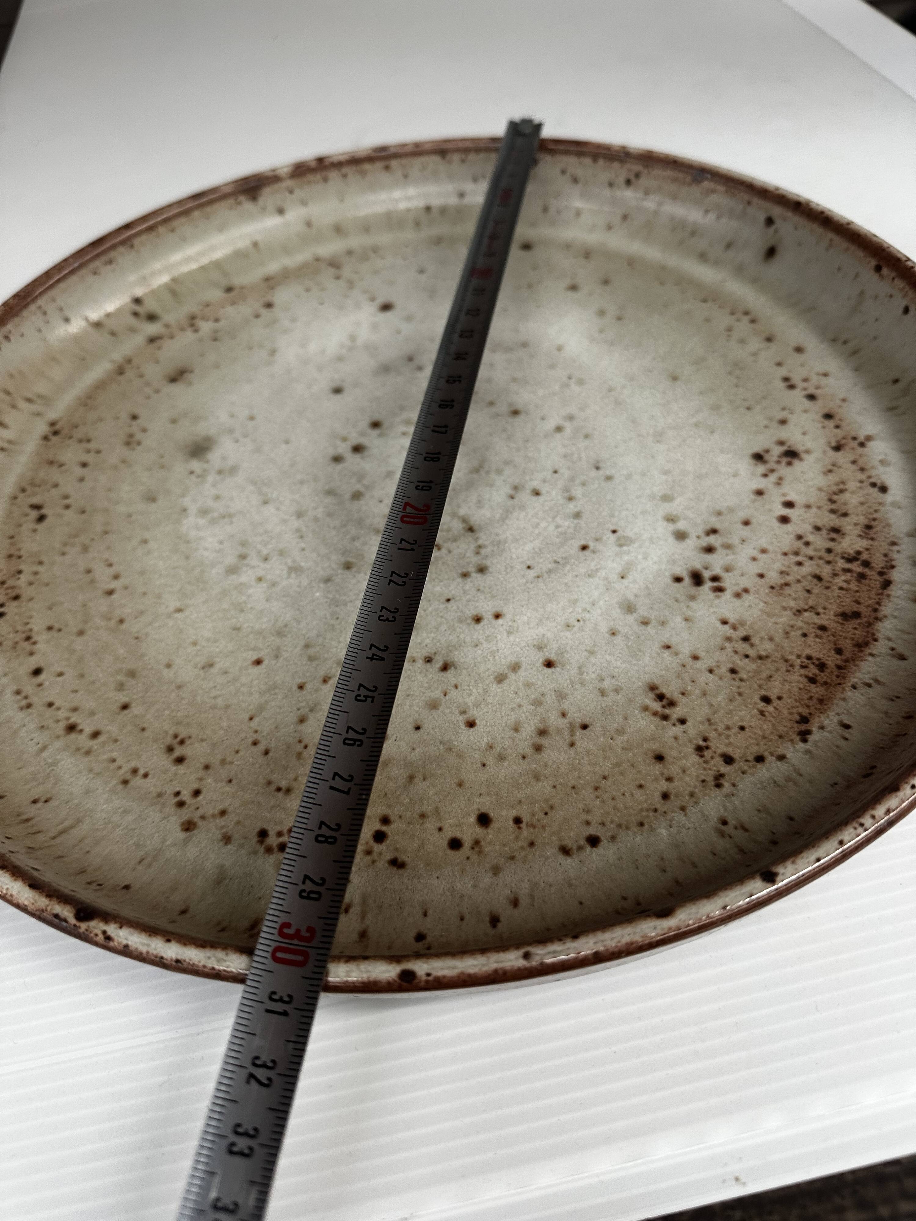 Large round stoneware dish signed Vallauris origin Diameter 30 cm