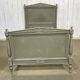 Lit de style Louis XVI début XXème en bois peint