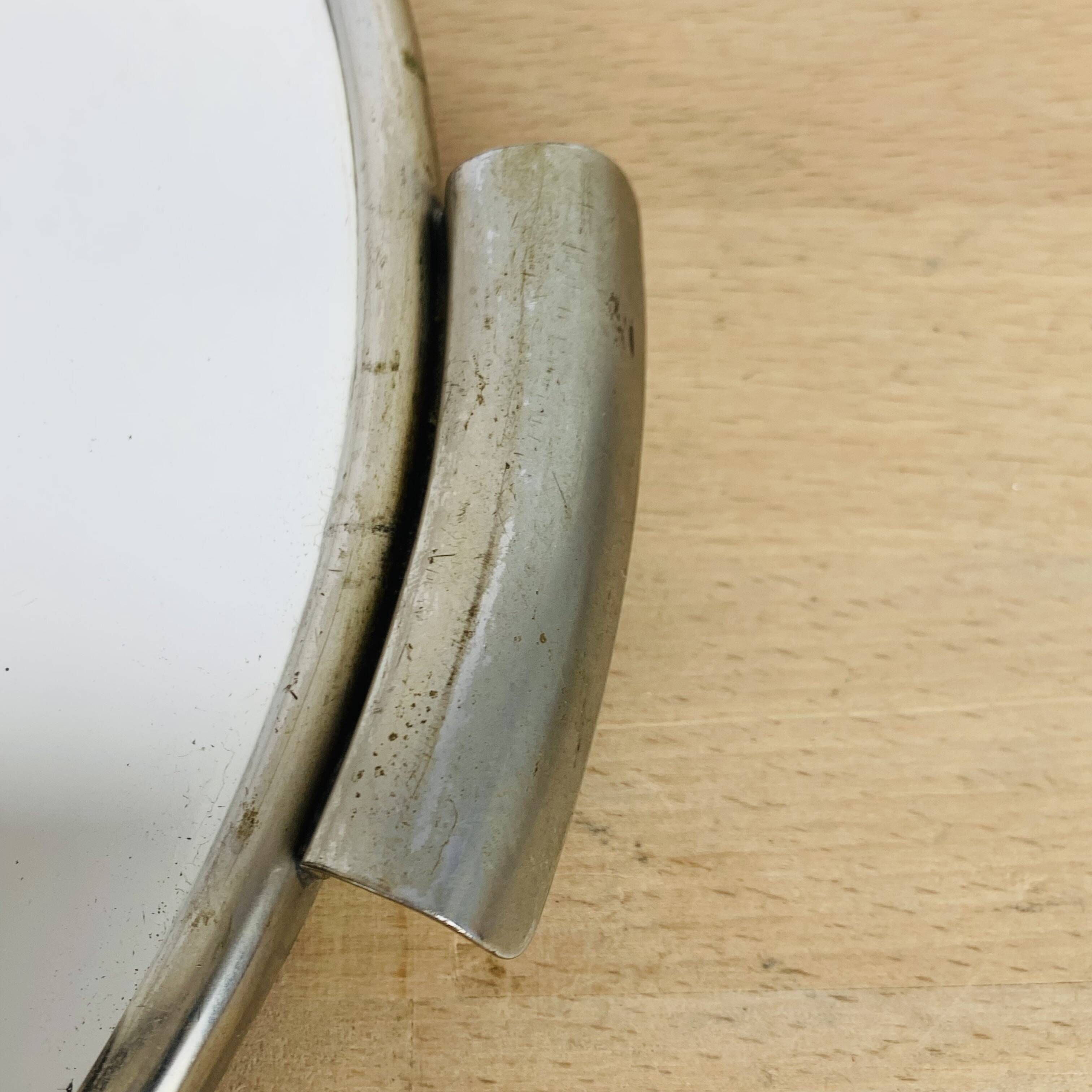 Round mirror plateau from the 1950s.