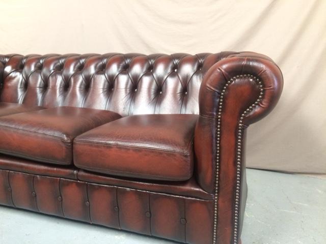 Brown leather chesterfield sofa