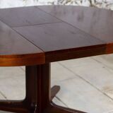Baumann extendable round table