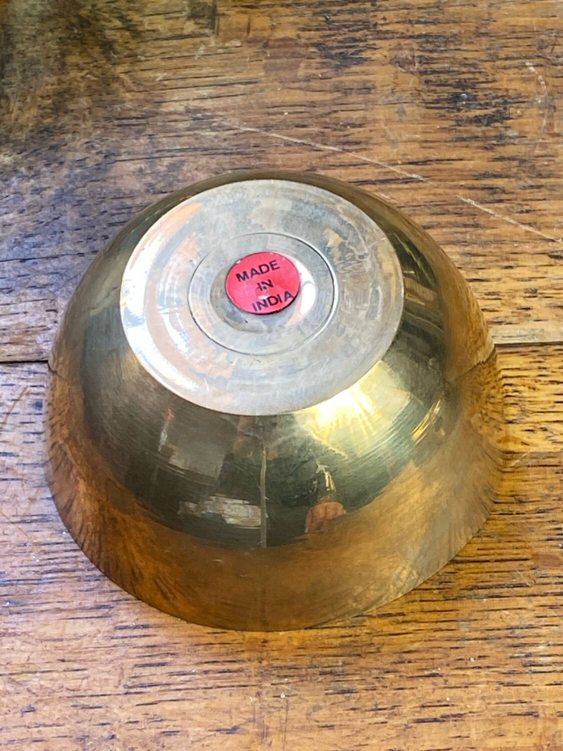 Bonbonnière, in the shape of an apple, made of brass.
