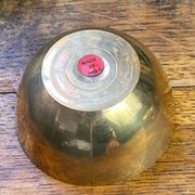 Bonbonnière, in the shape of an apple, made of brass.