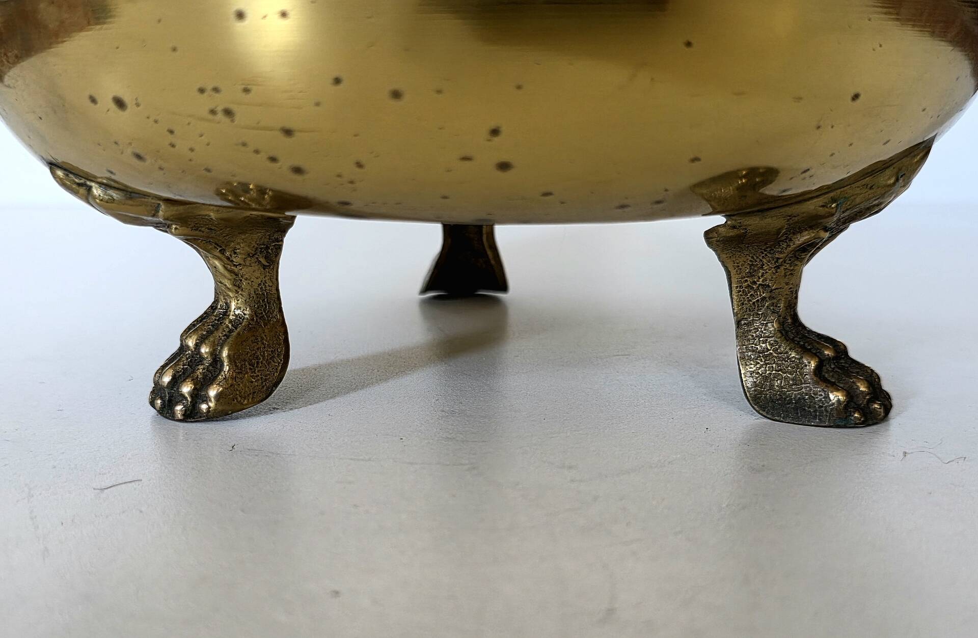Hollywood Regency style umbrella stand, brass finish and lio pattern.