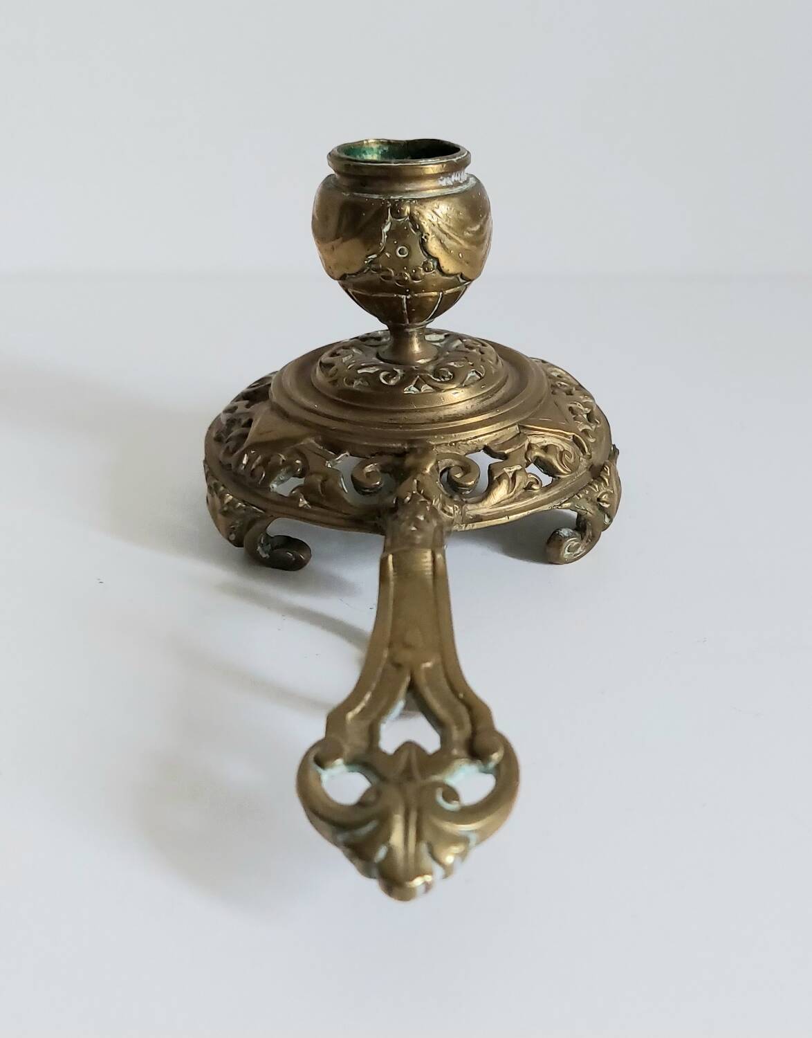"Cave rat" brass candlestick