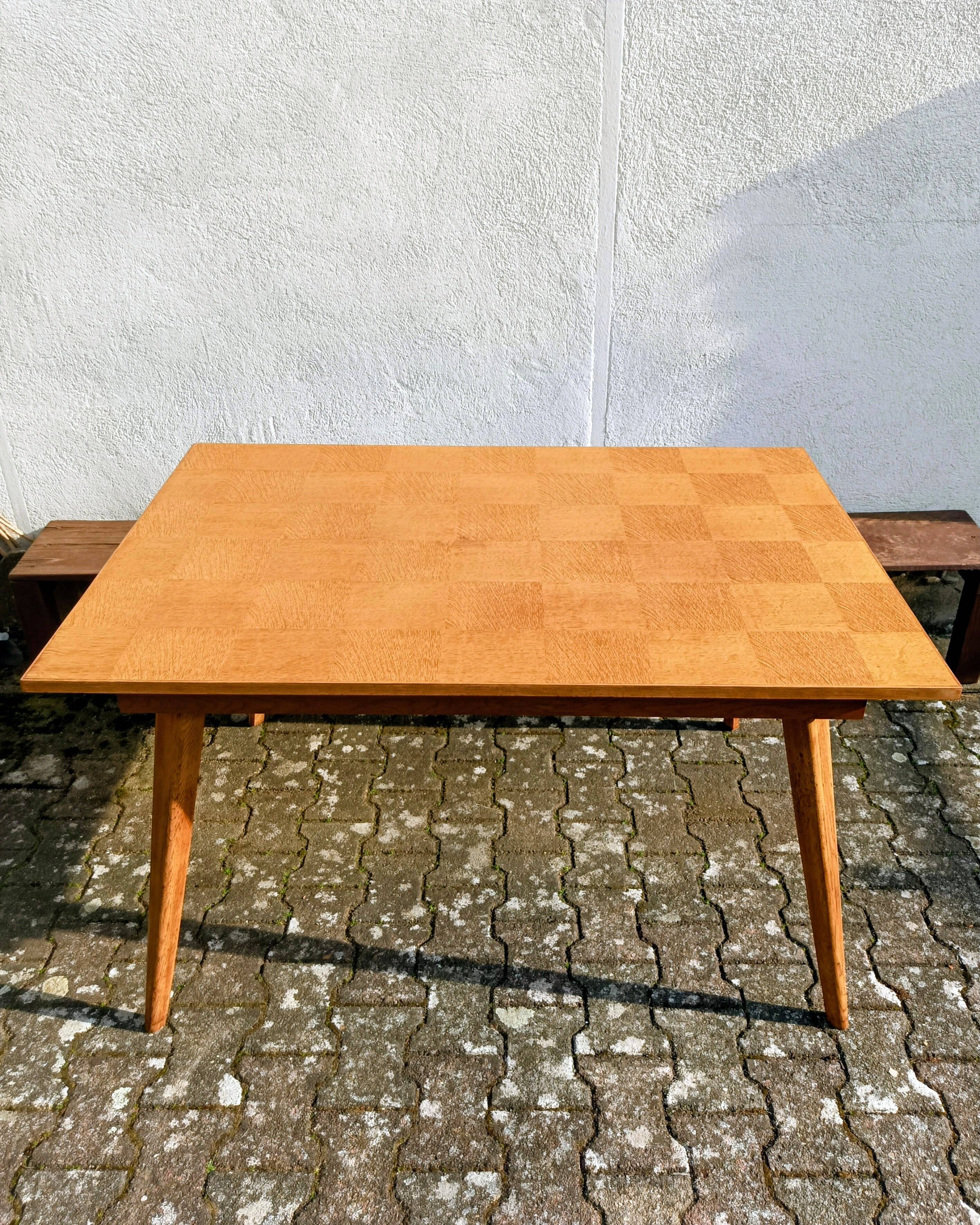 Dining table with tapered legs