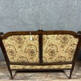 Banquette à oreilles de style Louis XVI en bois sculpté vers 1850