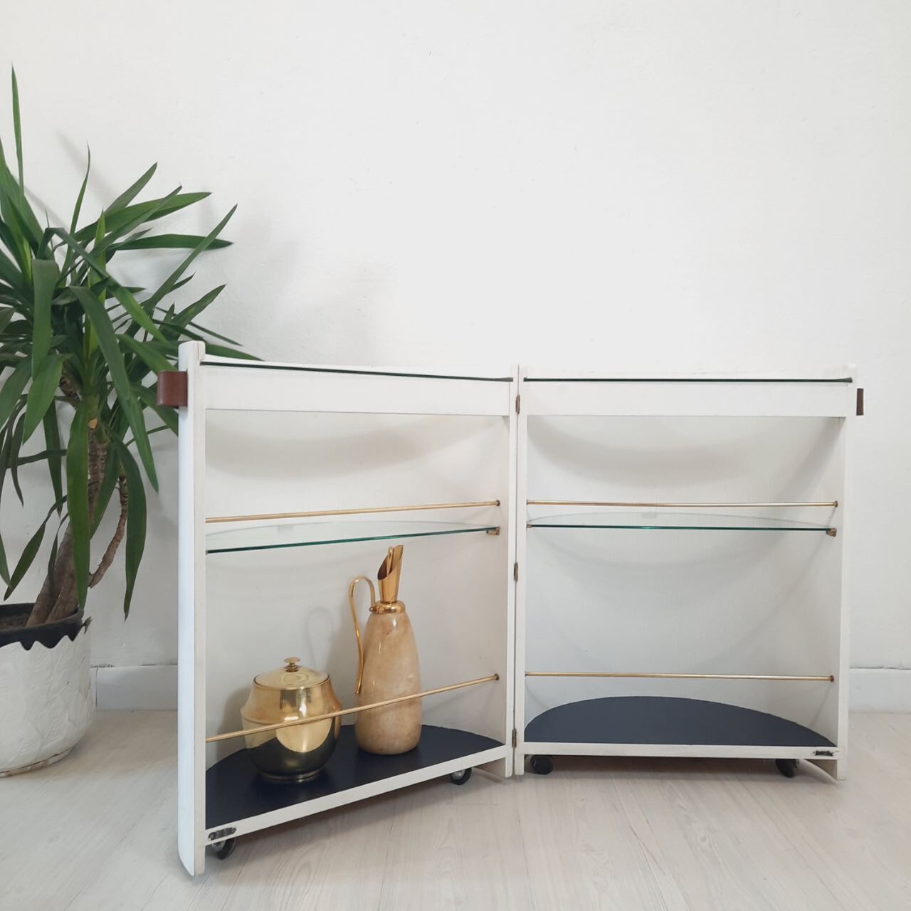 Vintage openable cylinder shaped bar cabinet, wood, brass and glass.