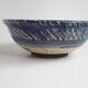 Blue enamelled terracotta cup