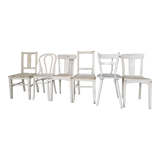 Set of 6 mismatched white chairs
