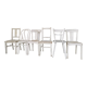 Set of 6 mismatched white chairs