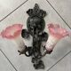 Apply 2 pink tulip Art Nouveau wall lights.