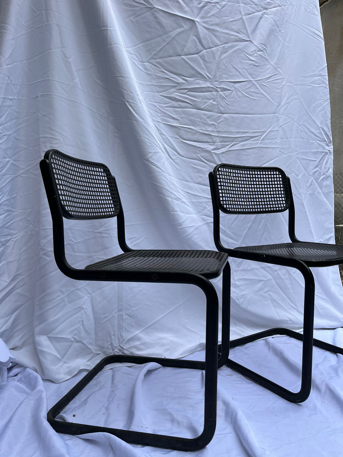 2 metal chairs