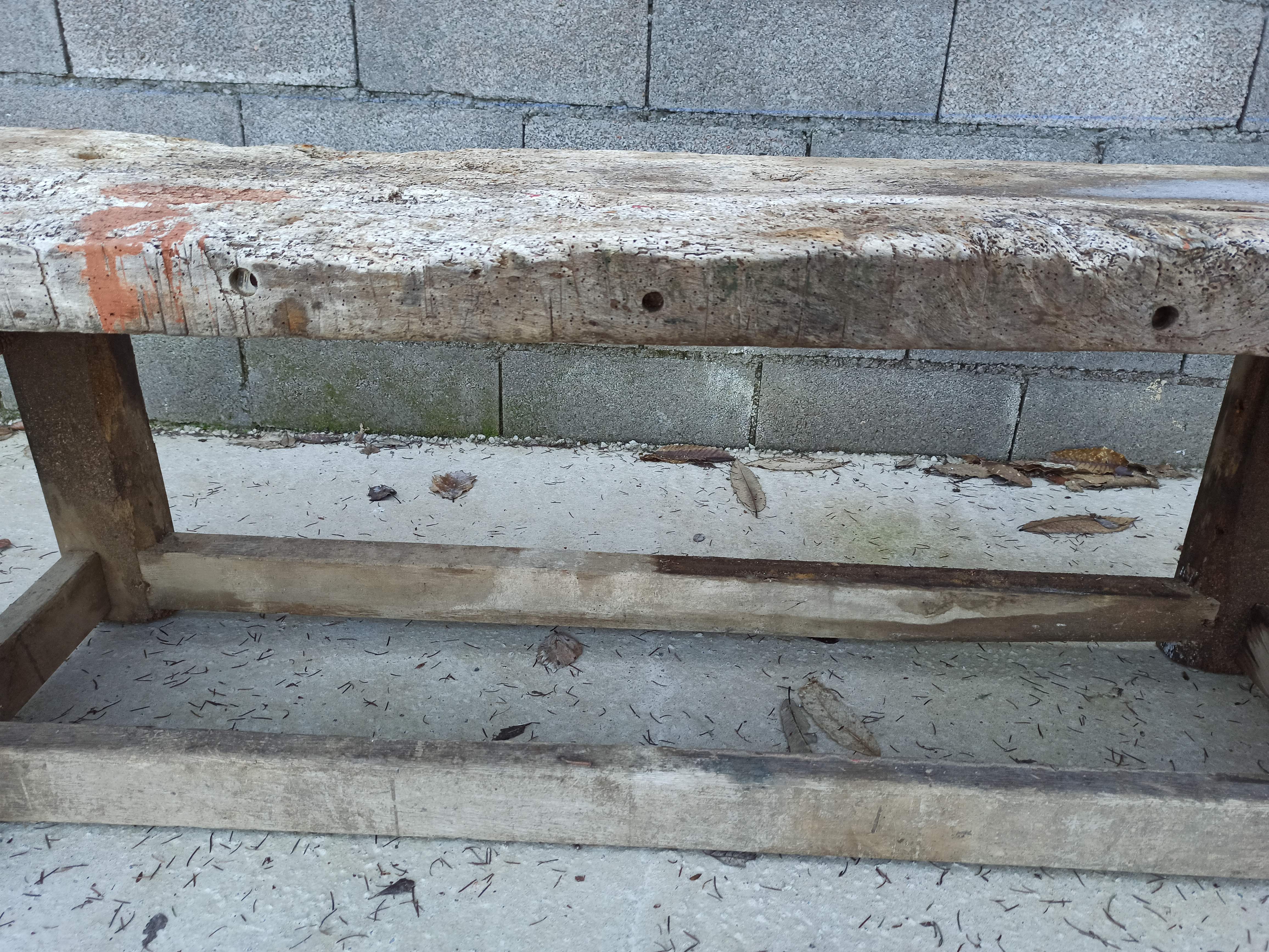 Wooden carpenter's workbench with iron and wooden vice
